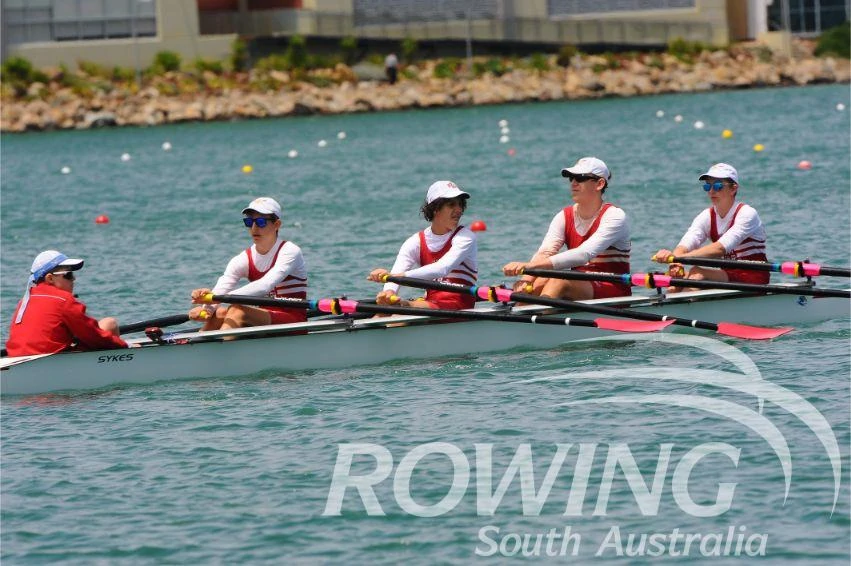 Junior rowers competing at a regatta